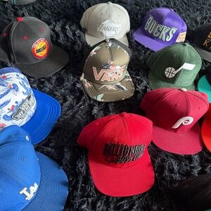 25 snap backs used but good condition mostly $200